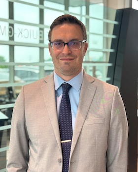Staff member Andrew Pullen from d3b16ba1c74e