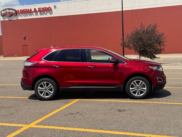 Used 2015 Ford Edge Titanium with VIN 2FMTK3K96FBC42153 for sale in Marshall, Minnesota