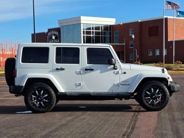 Used 2013 Jeep Wrangler Unlimited Sahara with VIN 1C4HJWEG1DL568321 for sale in Marshall, Minnesota