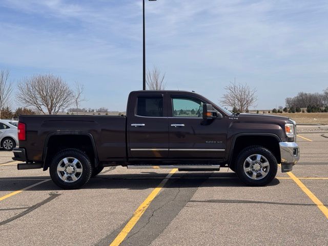 Used 2016 GMC Sierra 2500HD SLT with VIN 1GT22TE86GZ167942 for sale in Marshall, Minnesota