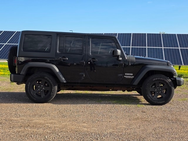 Used 2014 Jeep Wrangler Unlimited Sport with VIN 1C4BJWDG9EL249953 for sale in Marshall, Minnesota