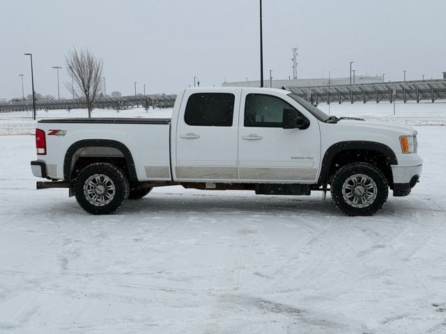 Used 2013 GMC Sierra 2500HD SLT with VIN 1GT121E82DF207026 for sale in Marshall, Minnesota