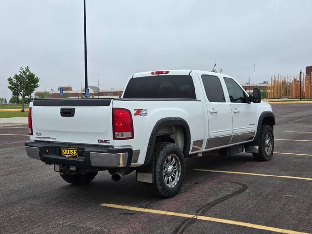 Used 2013 GMC Sierra 2500HD SLT with VIN 1GT121E82DF207026 for sale in Marshall, Minnesota