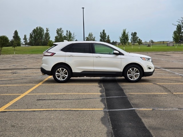 Used 2015 Ford Edge SEL with VIN 2FMTK4J89FBC30948 for sale in Marshall, MN