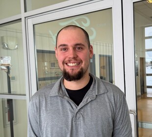 Staff member Max Sartwell from ID_ae6729666143