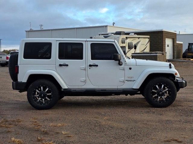 Used 2013 Jeep Wrangler Unlimited Sahara with VIN 1C4HJWEG1DL568321 for sale in Marshall, MN