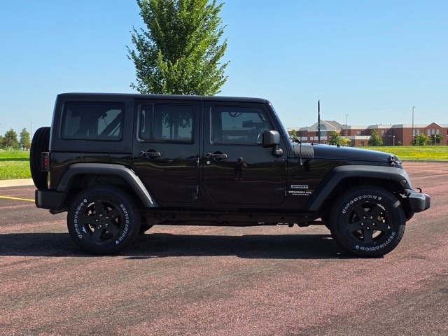 Used 2014 Jeep Wrangler Unlimited Sport with VIN 1C4BJWDG9EL249953 for sale in Marshall, Minnesota