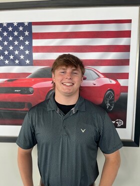 Staff member Aiden Sisson from 5a9ea3ad4bf0