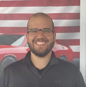 Staff member Christopher Robles from ef6f6add8f01