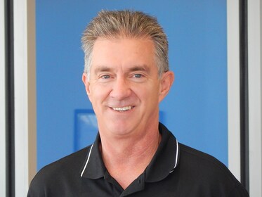 Staff member Norm Arnold from ID_f0d7fa5e9022