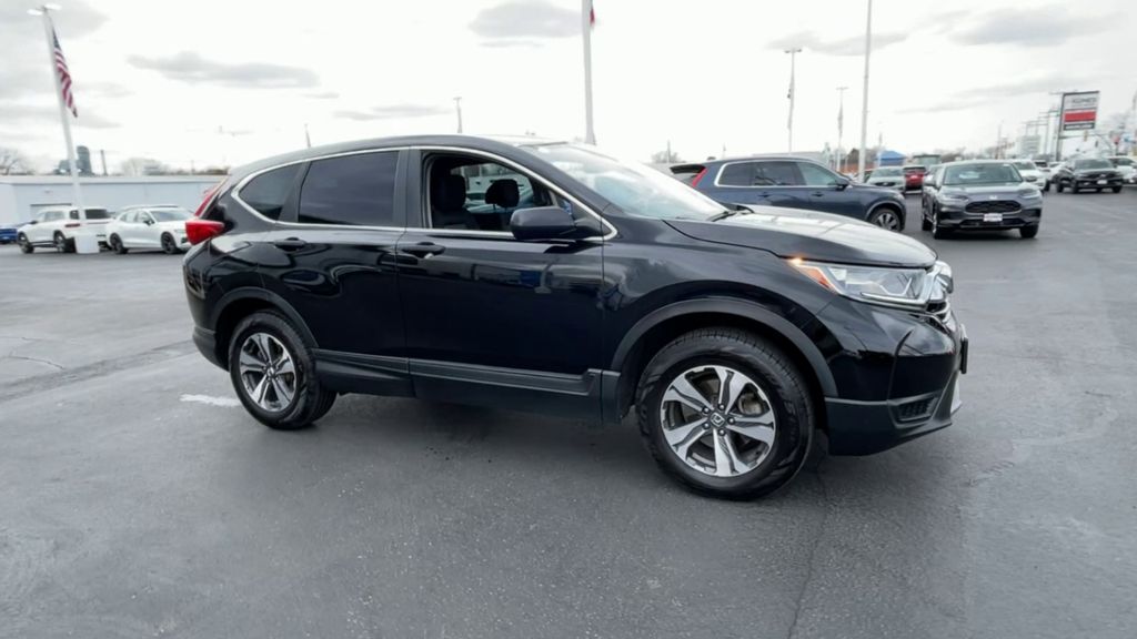 Used 2017 Honda CR-V LX with VIN 5J6RW6H31HL002299 for sale in Sycamore, IL