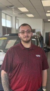 Staff member Christopher Ross from 0ed621021bc2