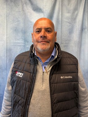 Staff member Eddie Burgos from d1f80b923e37