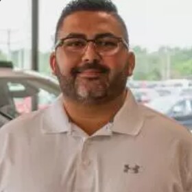 Staff member Gino Mangicavallo from 6a689abd91c3