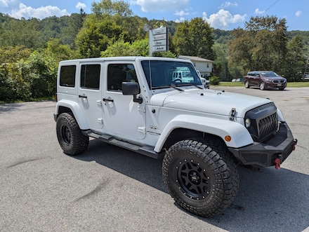 Featured Used 2018 Jeep Wrangler JK Unlimited Sahara 4x4 SUV 1C4BJWEG9JL844729 for Sale in Mahaffey, PA