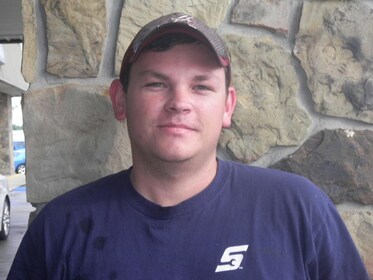Staff member NATHAN SADDLER from c67c83431651