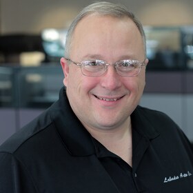 Staff member KEVEN MCKEE from ID_23faeb61dc93