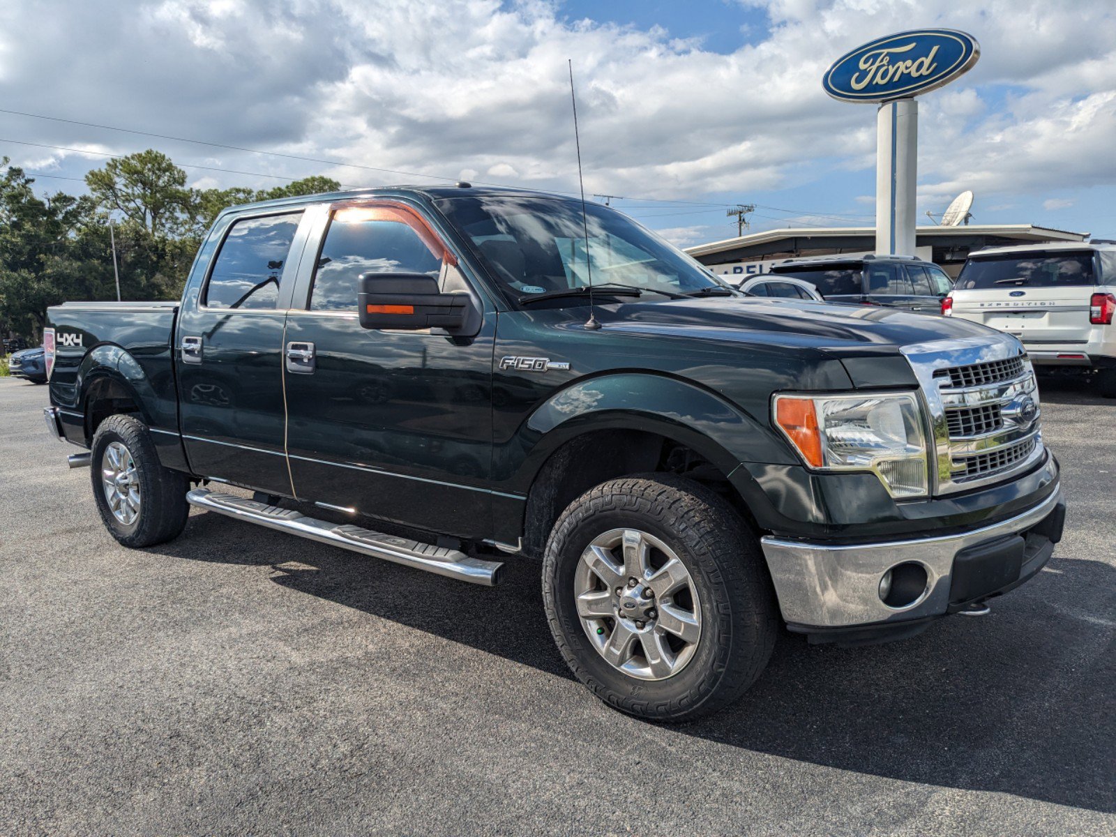 Used 2014 Ford F-150 XLT with VIN 1FTFW1EF6EKG42990 for sale in Labelle, FL