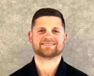 Staff member Nathan Carithers from 7883464970cb