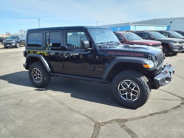 Used 2024 Jeep Wrangler 4-Door Rubicon with VIN 1C4PJXFGXRW266080 for sale in Mankato, Minnesota