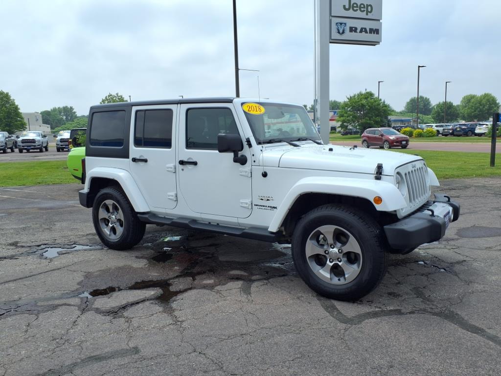 Used 2018 Jeep Wrangler Unlimited Sahara with VIN 1C4HJWEG7JL900547 for sale in Mankato, Minnesota