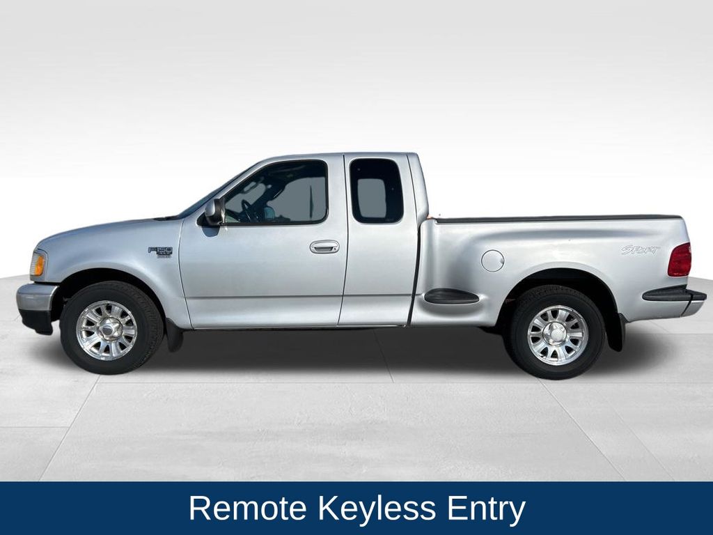 Used 2002 Ford F-150 XLT with VIN 1FTRX07W42KC24831 for sale in Lake City, Minnesota