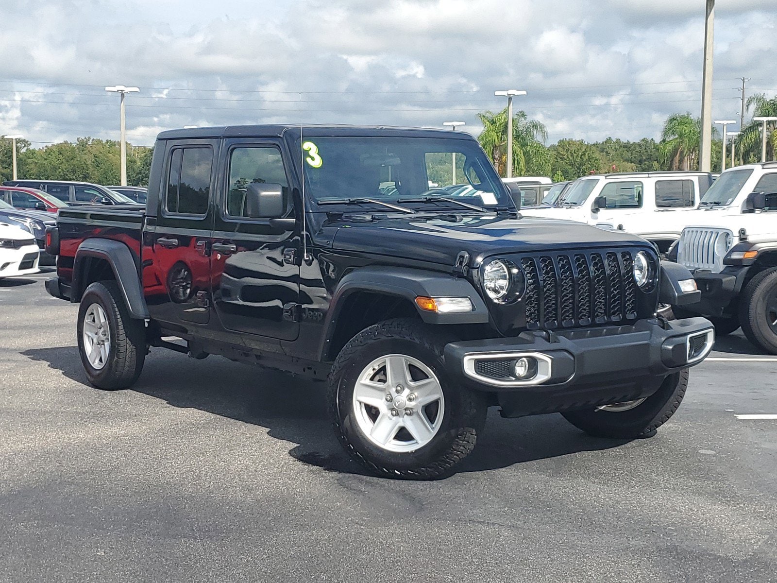 Used 2023 Jeep Gladiator Sport S with VIN 1C6HJTAG2PL512128 for sale in Lakeland, FL