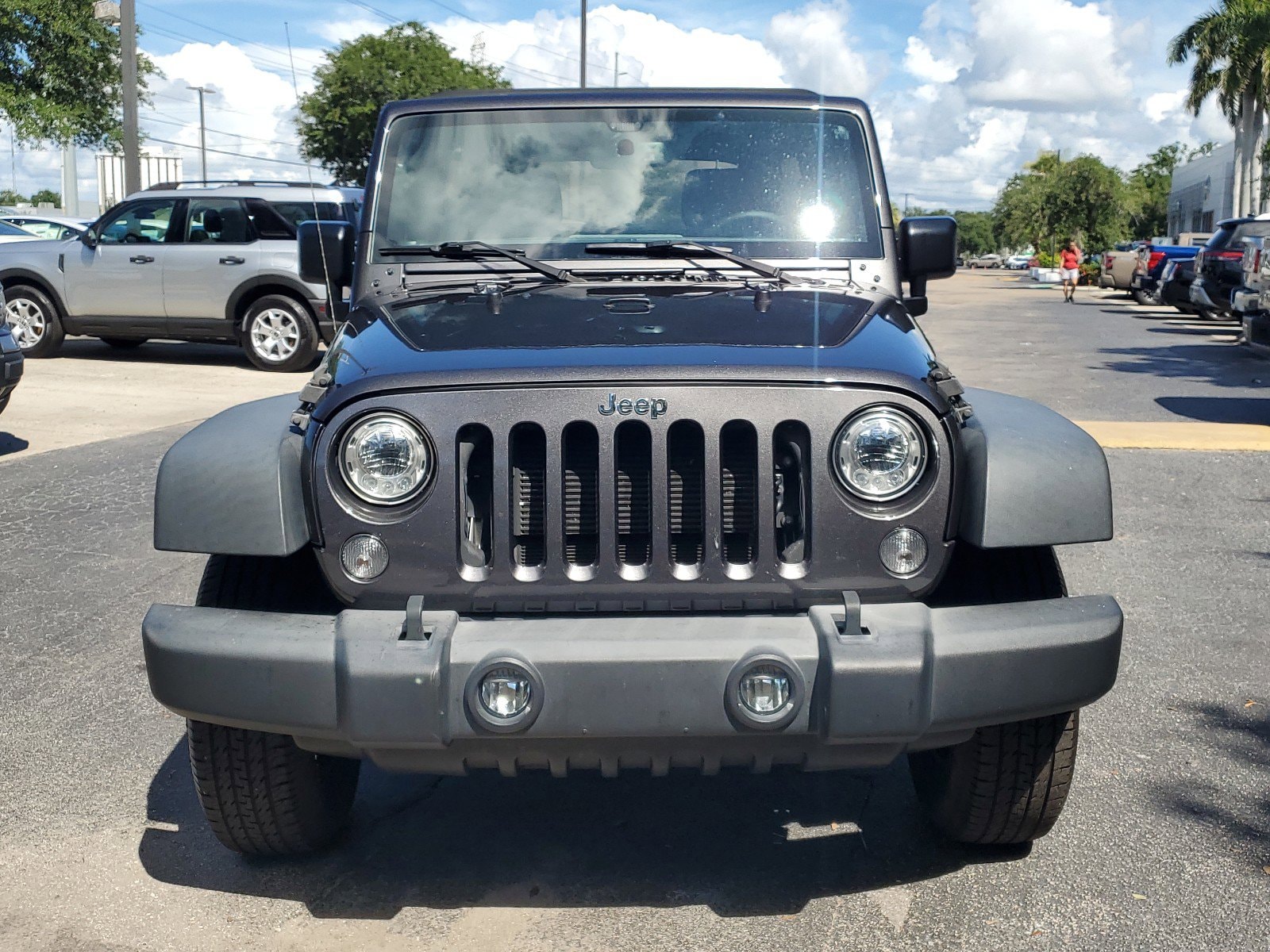 Used 2017 Jeep Wrangler Unlimited Sport S with VIN 1C4BJWDG7HL671336 for sale in Lakeland, FL