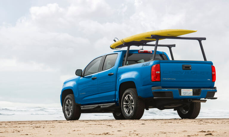 2022 Chevy Colorado exterior beach with surfboard