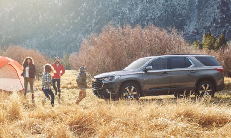 2021 Chevy Traverse exterior with family camping