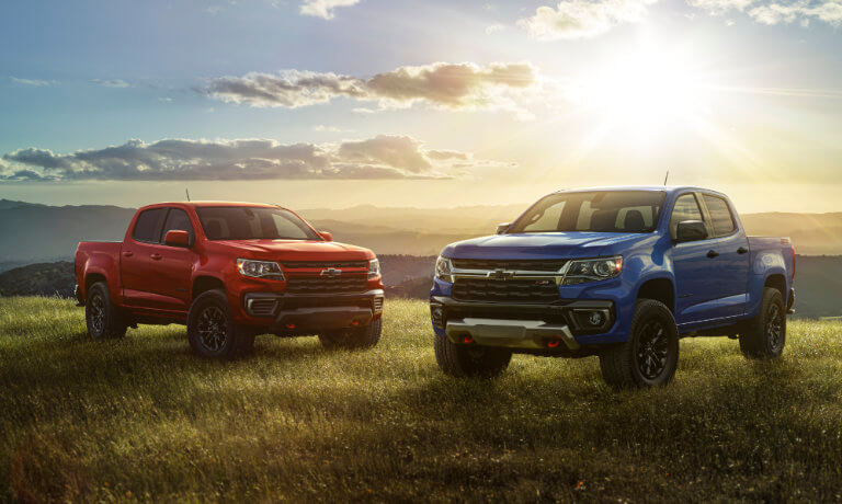 2022 Chevy Colorado exterior scenic side by side shot of two trucks