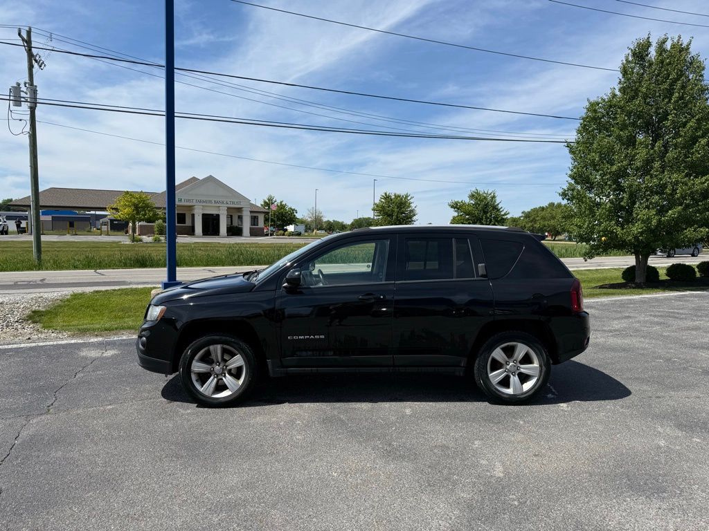 Used 2015 Jeep Compass Sport with VIN 1C4NJCAB1FD418265 for sale in Huntington, IN