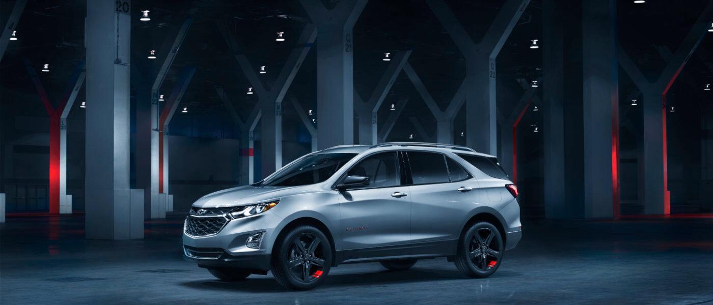 2021 Chevy Equinox SUV in garage with pillars at night scene