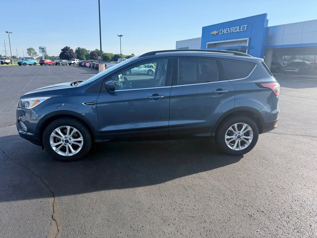 Used 2018 Ford Escape SE with VIN 1FMCU9GD7JUA10948 for sale in Warsaw, IN