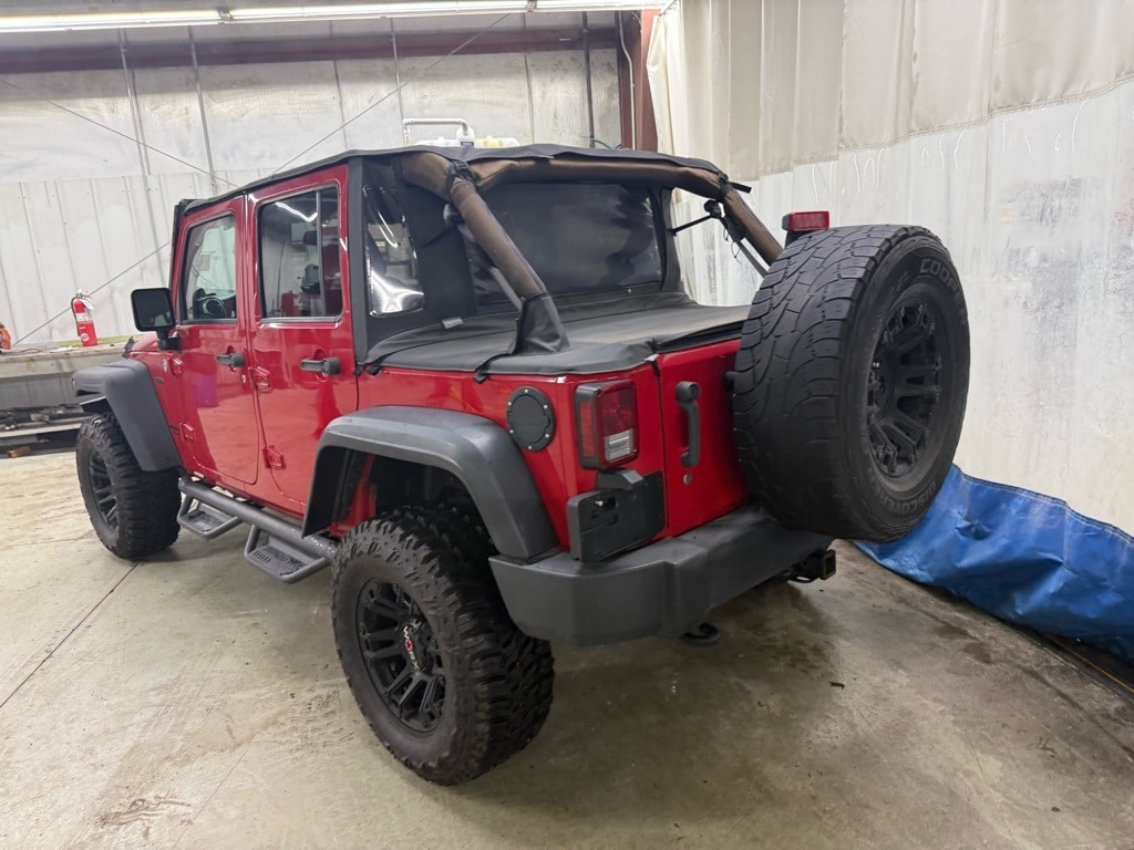 Used 2014 Jeep Wrangler Unlimited Rubicon with VIN 1C4BJWFG2EL110633 for sale in Warsaw, IN