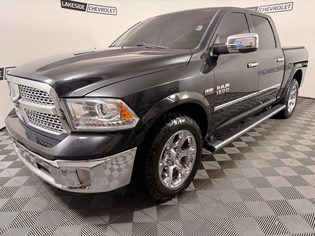 Used 2015 RAM Ram 1500 Pickup Laramie with VIN 1C6RR7NT0FS778716 for sale in Warsaw, IN