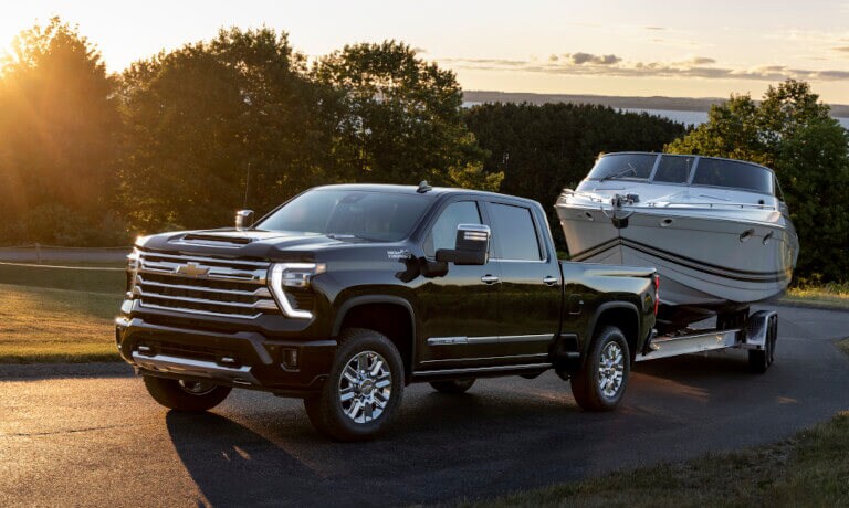 2026 Chevy Silverado 2500 towing a boat