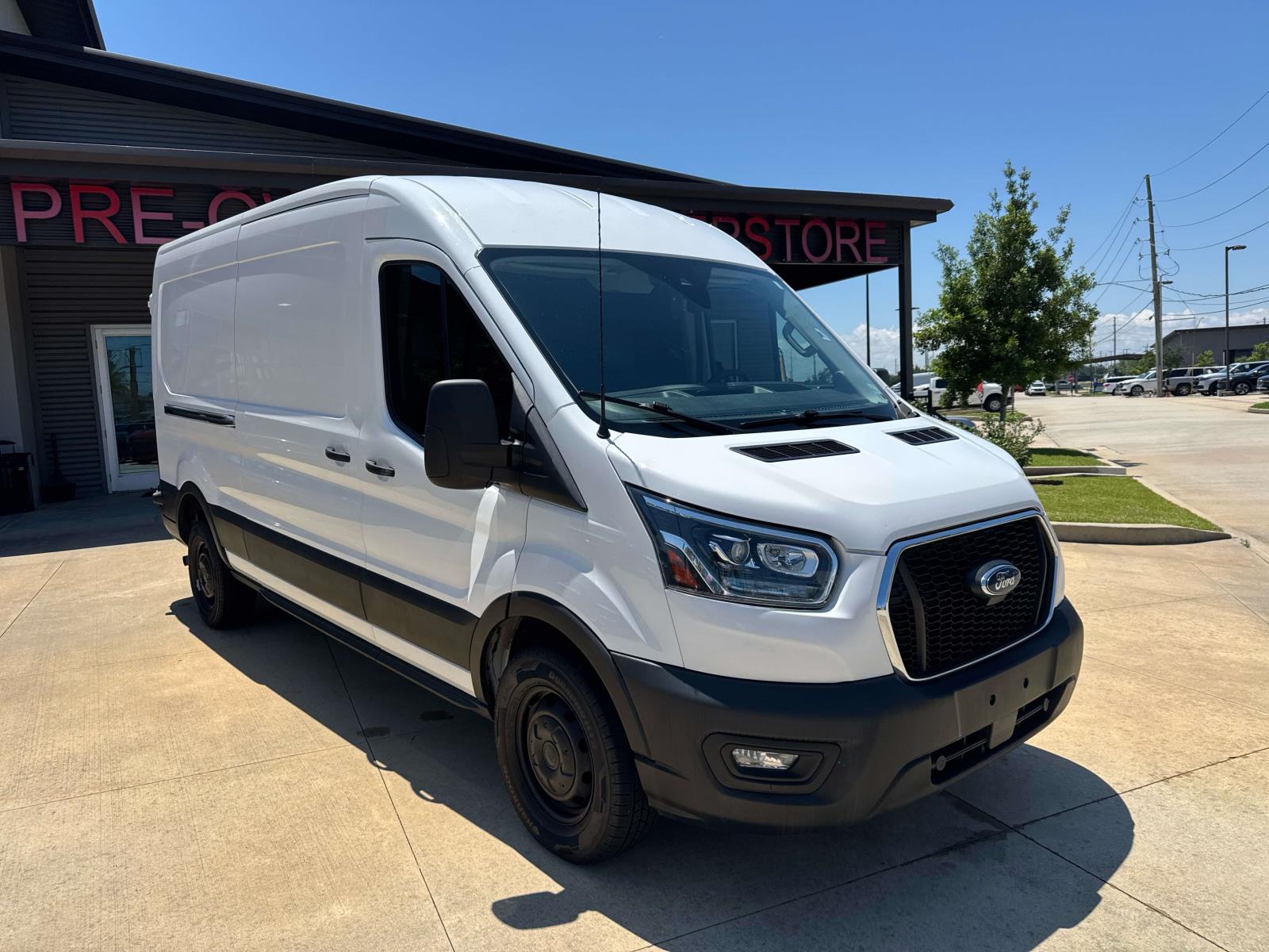 2023 Ford Transit 250 Med Roof 148 WB's photo