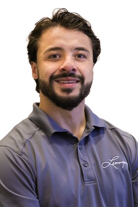 Staff member Evan Curole from 8bf25ddfe38c