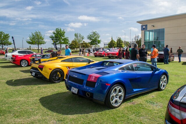  Person cheerfully signing documents.