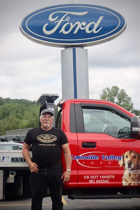 Staff member Larry Lakus from ID_a826d681beff