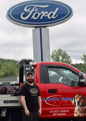 Staff member Jonathan White-Stokes from ID_e863697e6fba