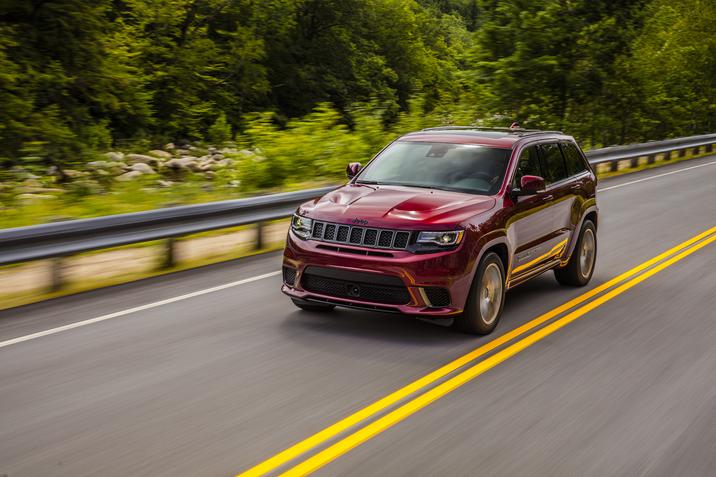 2018 Jeep Grand Cherokee Trackhawk Front Red Driving Exterior 2018 Jeep Grand Cherokee Trackhawk Front Red Driving Exterior