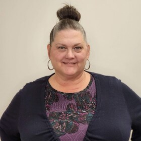 Staff member April Reeser from 9564ef6d3edc