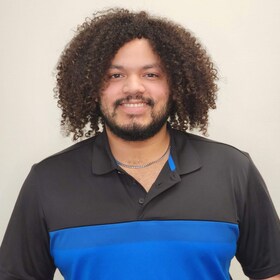 Staff member Alexis Perez from 9564ef6d3edc