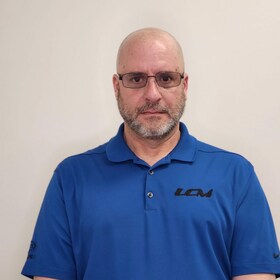 Staff member Eric Riley from 9564ef6d3edc