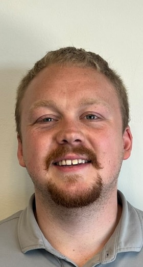 Staff member James Warren from 543792b89c75