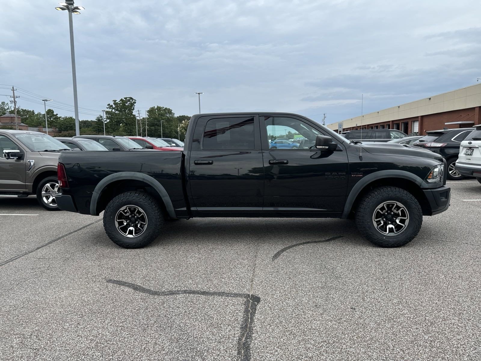 Certified 2016 RAM Ram 1500 Pickup Rebel with VIN 1C6RR7YT0GS356734 for sale in Collierville, TN