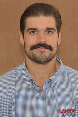 Staff member Alexander Griffin from ID_a08941e28b2a