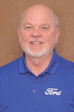 Staff member Mitchell Denison from ID_567069